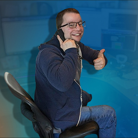 Man sitting in office chair with thumbs up, smiling, on phone