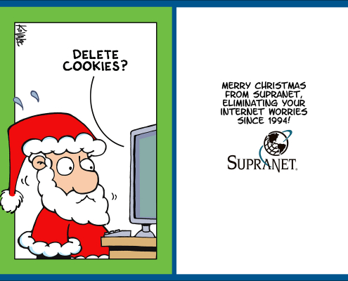 Holiday card with Santa at the computer with a confused or concerned expression. Card says "delete cookies?" Inside of card says "Merry Christmas from SupraNet, Eliminating your Internet worries since 1994!"