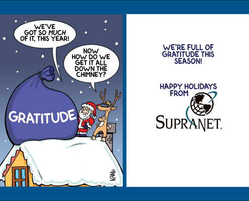 Santa and reindeer on top of roof with huge sack that says "Gratitude on it." Santa, "We've got so much of it this year!" Reindeer (with virtual reality goggles) "Now how do we get it all down the chimney?" Inside card: We're full of gratitude this season.