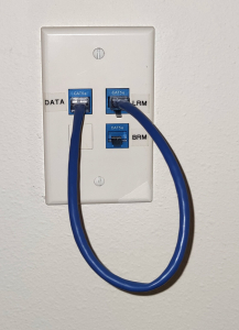 Jack jumper panel with Data port on top left connected to LRM port on top right